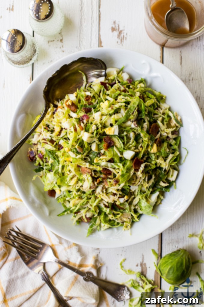 Crisp Shaved Brussels Salad with Warm Bacon Vinaigrette 1 featured 21196