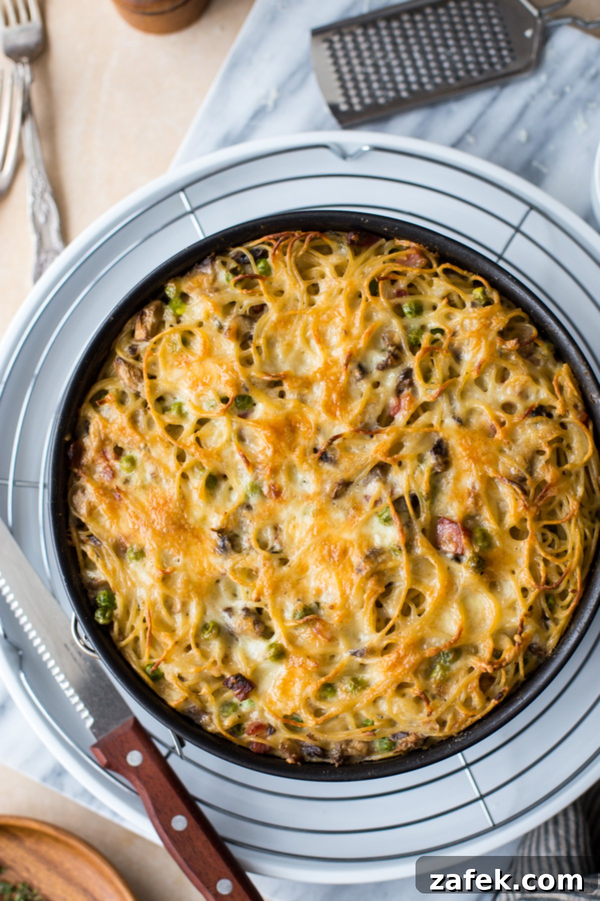 Hearty Pancetta, Mushroom & Pea Spaghetti Pie 1 featured 24044