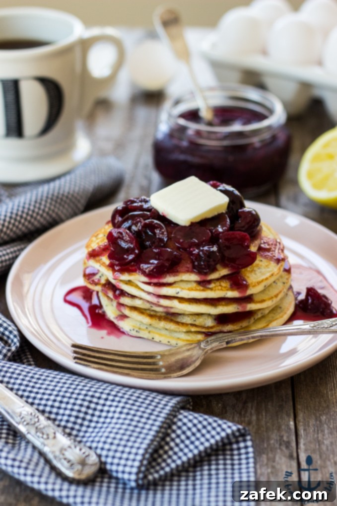 Zesty Lemon Poppy Seed Pancakes with Ruby Cherry Compote 1 featured 9428