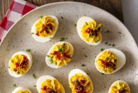 Deviled Eggs with Wasabi Kick and Prosciutto Crunch