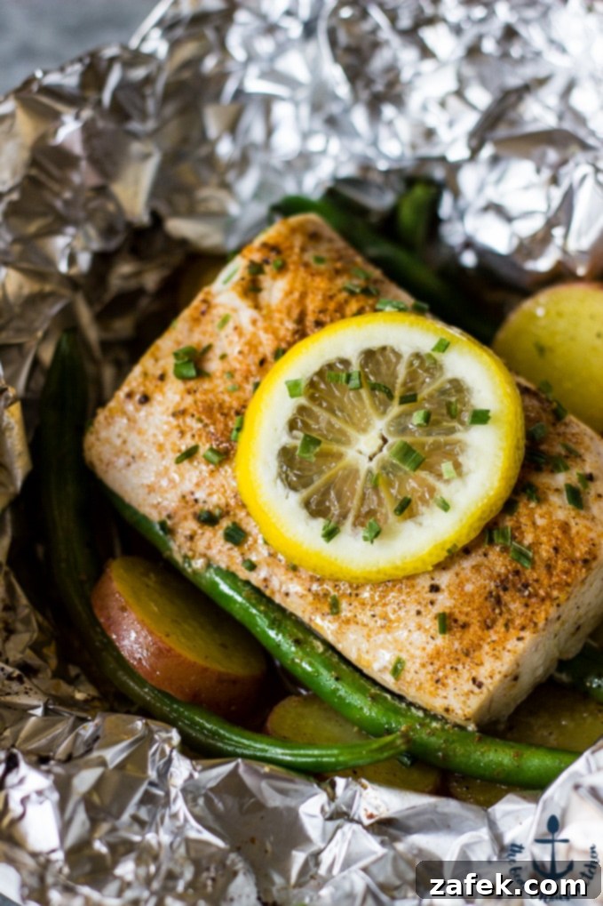 Savory Grilled Mahi Mahi and Veggie Foil Bundles 2 Flavorful Grilled Mahi Mahi and Seasonal Vegetables in Foil Packets for a Healthy Summer Meal