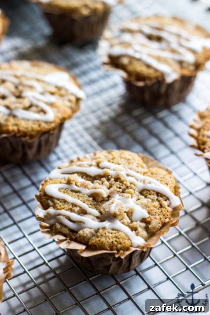 Close-up of fluffy Apple Spice Crumb Muffins with crumb topping