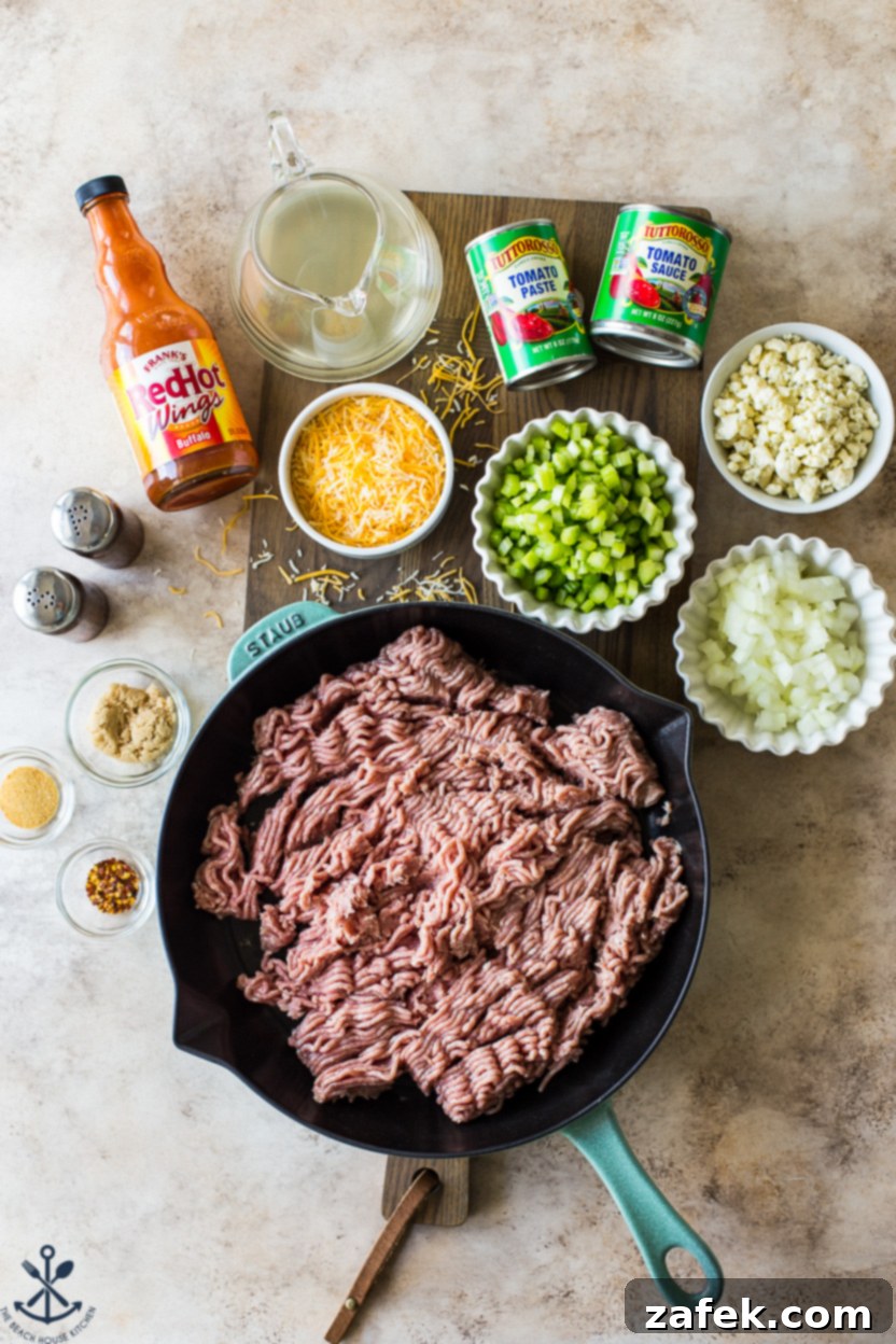 Spicy Buffalo Sloppy Joes 4 Overhead photo of all the fresh ingredients for making buffalo sloppy joes laid out on a kitchen counter.