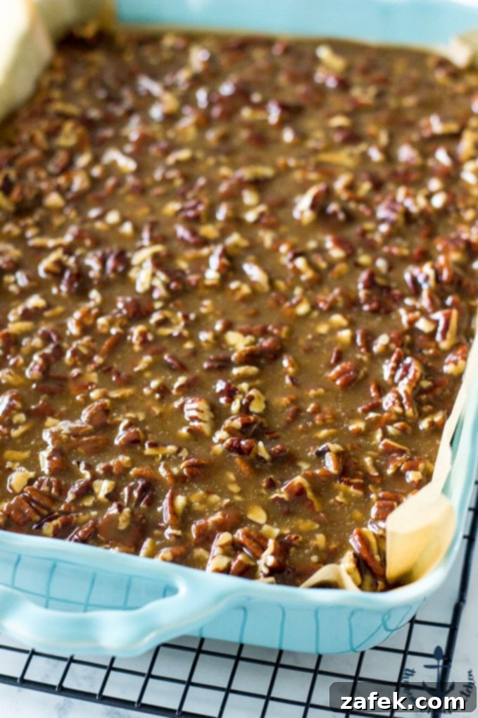 Close-up of the smooth, creamy cinnamon cheesecake layer before topping
