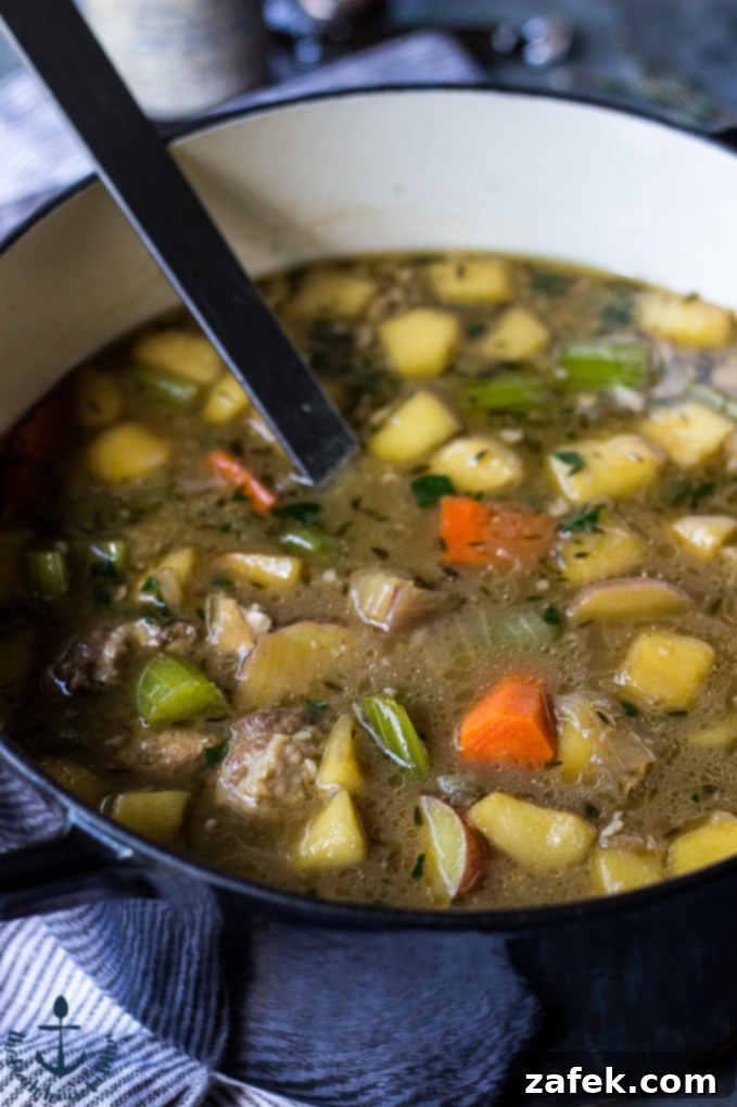 Ale-Braised Pork & Apple Stew with Hearty Vegetables 4 Ingredients for Ale Braised Pork Stew laid out on a cutting board.