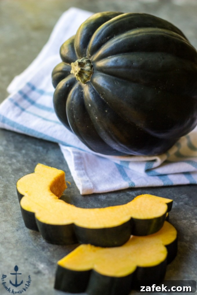 One-Pan Sausage & Acorn Squash Harvest 4 Prepped acorn squash slices and red onion wedges before roasting