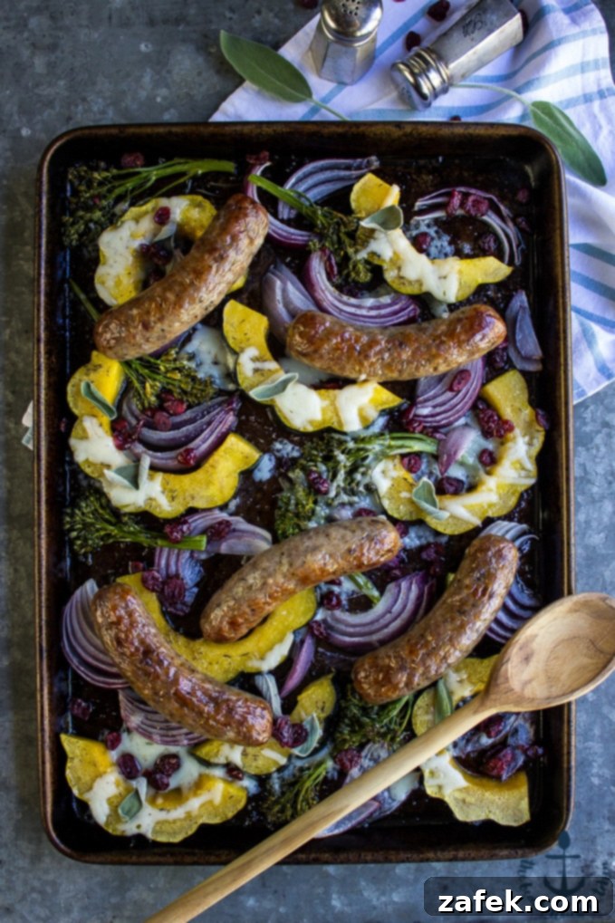 One-Pan Sausage & Acorn Squash Harvest 5 Ingredients for Sausage Acorn Squash Sheet Pan Dinner tossed with olive oil and herbs