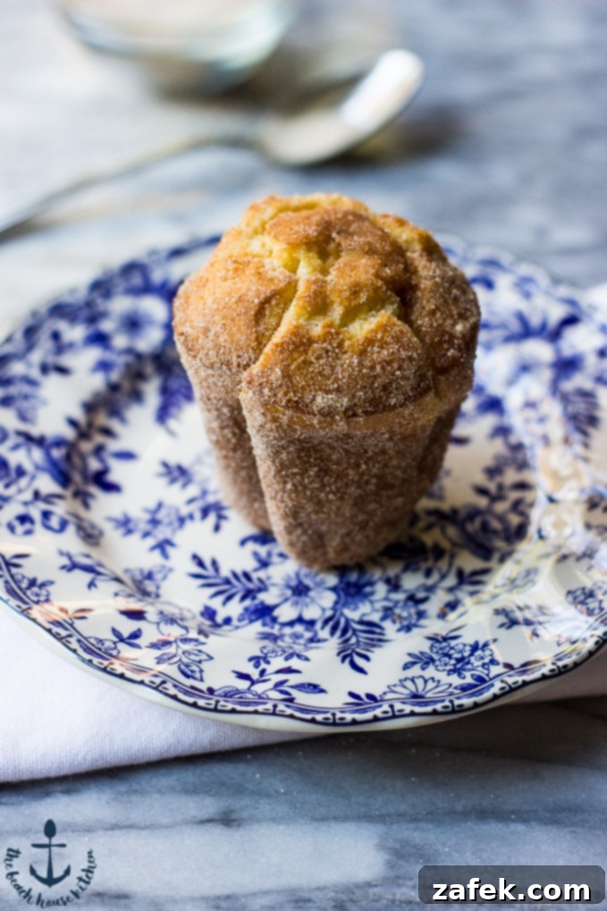 Aromatic Chai Clouds 2 Delicious Chai Spiced Popovers stacked on a plate, ready for breakfast