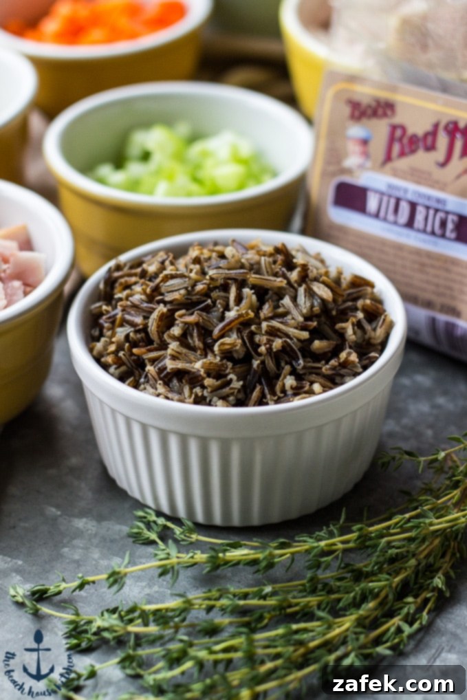 Serving of creamy Turkey Wild Rice Soup in a bowl