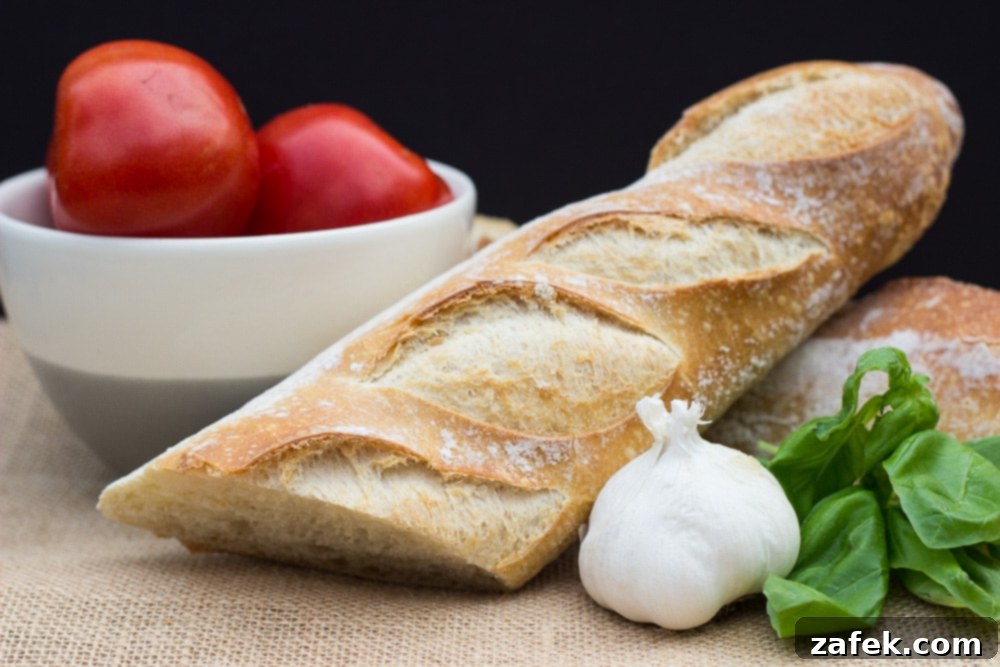 Garden Tomato and Herb Ricotta Toasts 4 Three Herbed Ricotta and Tomato Crostini on a white plate