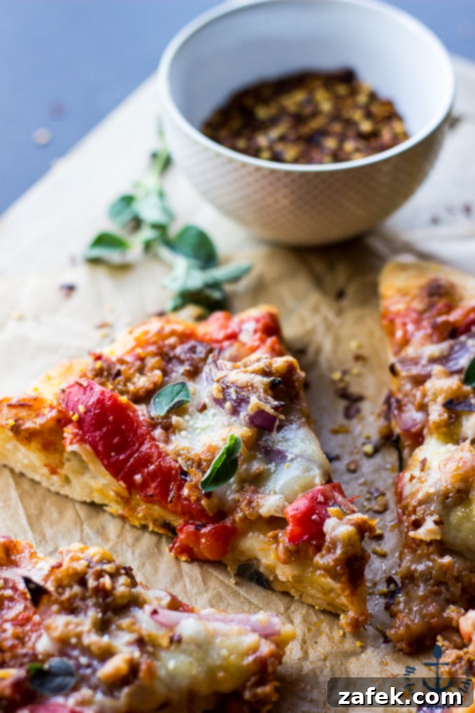 Spicy Sausage Pizza with Roasted Red Pepper and Onion