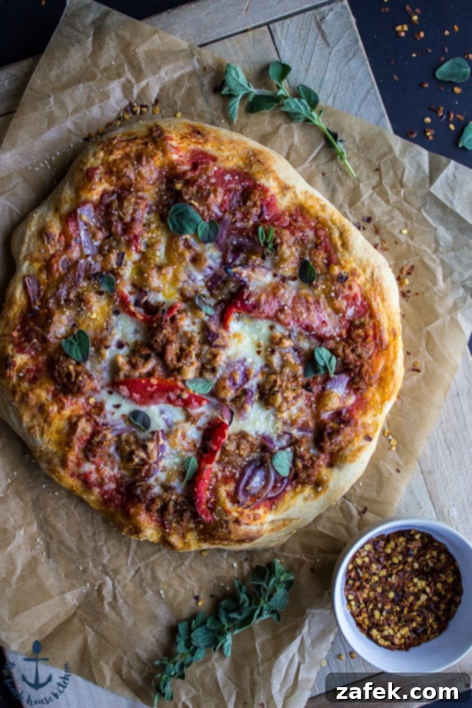 Spicy Sausage Pizza with Roasted Red Pepper and Onion