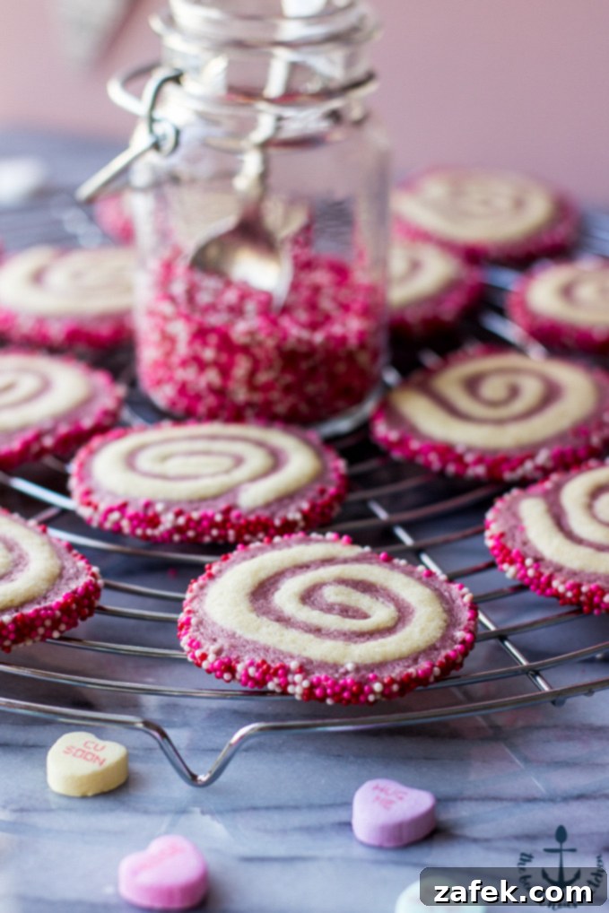 Sweetheart Raspberry Swirls 3 Close-up of freshly baked Valentine's Raspberry Pinwheel Cookies