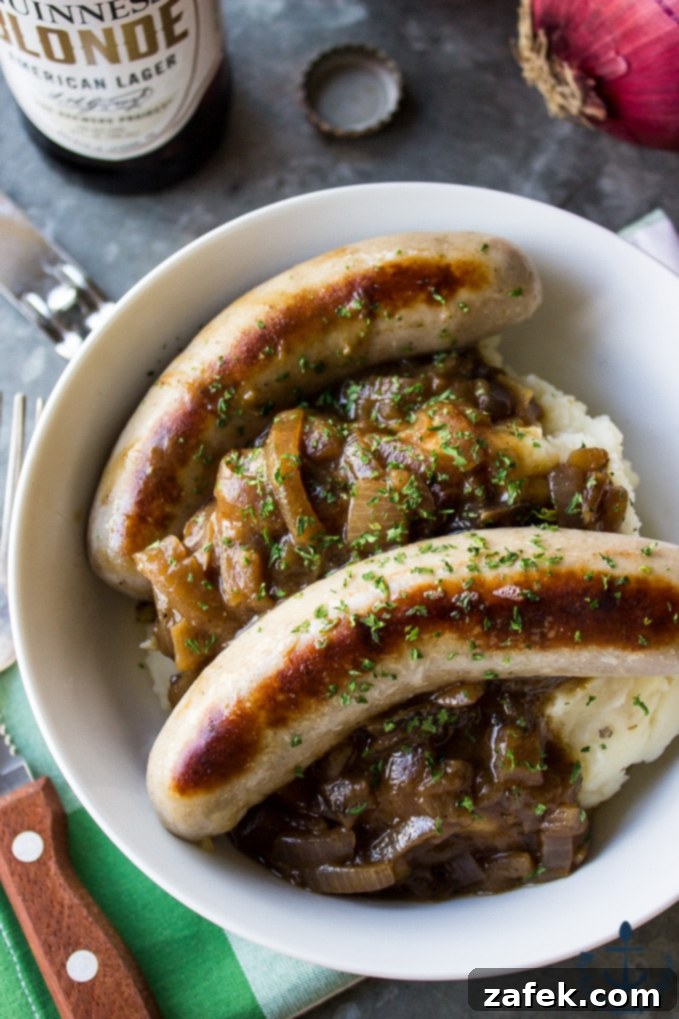 Guinness Onion Gravy Elevates Bangers and Mash 5 A close-up of the rich, savory Guinness Onion Gravy