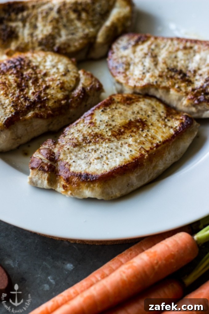 Homestyle Southern Smothered Pork Chops 4 Close-up of gravy with vegetables for pork chops