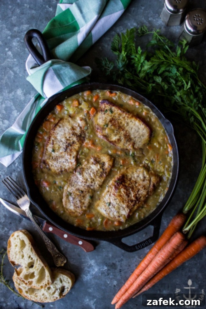 Homestyle Southern Smothered Pork Chops 5 Plated Southern Smothered Pork Chops with rice and green beans