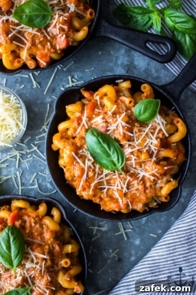 Bolognese Bake close-up showcasing the layered pasta and sauces