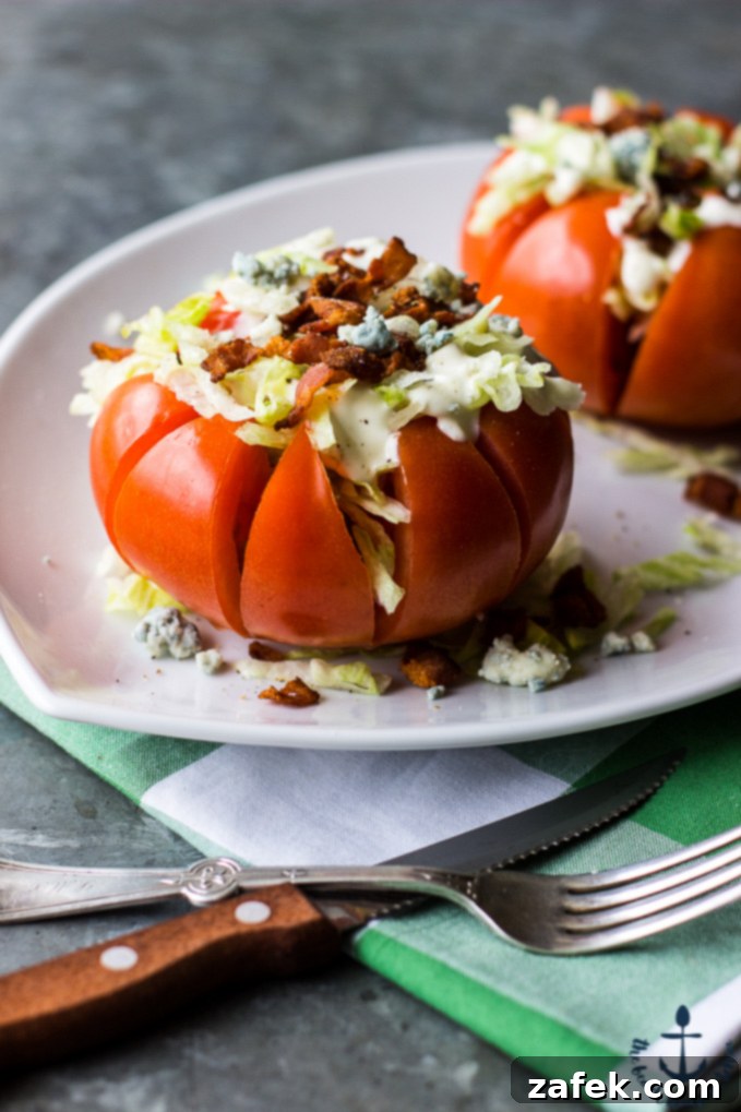 Savory Stuffed Tomatoes 2 Beautifully prepared Stuffed Tomato, showcasing its vibrant colors and delicious fillings, resembling a deconstructed wedge salad.