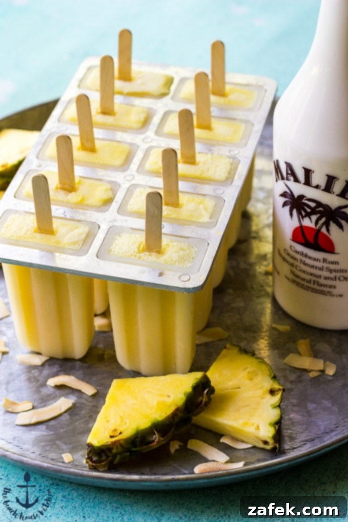 Sunshine Piña Pops 3 Fresh Piña Colada Popsicles waiting to be enjoyed