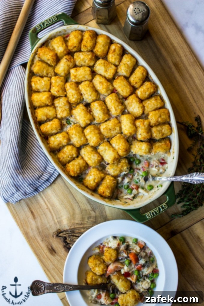 Fisherman's Pie 2 Tater Tot Topped Seafood Pot Pie - Golden crispy tater tots crown a rich, creamy seafood filling.