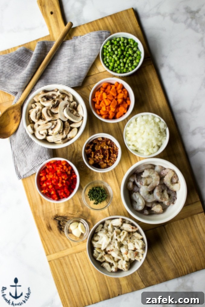 Fisherman's Pie 3 Seafood Pot Pie with Tater Tot Topping – Close-up of golden tater tots baked over a creamy seafood filling.