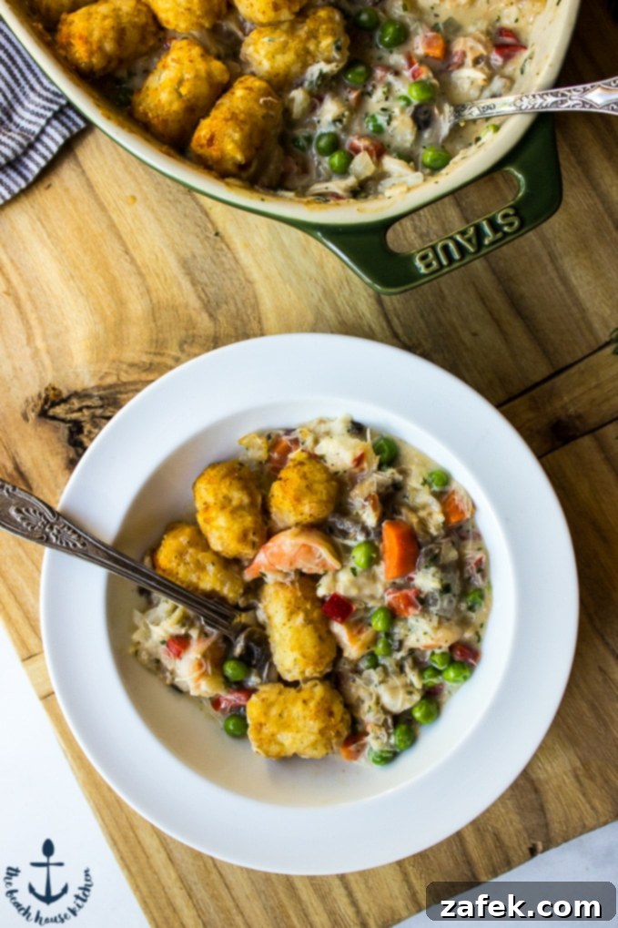 Fisherman's Pie 6 Tater Tot Topped Seafood Pot Pie - Another angle of the finished dish, showcasing its inviting texture.