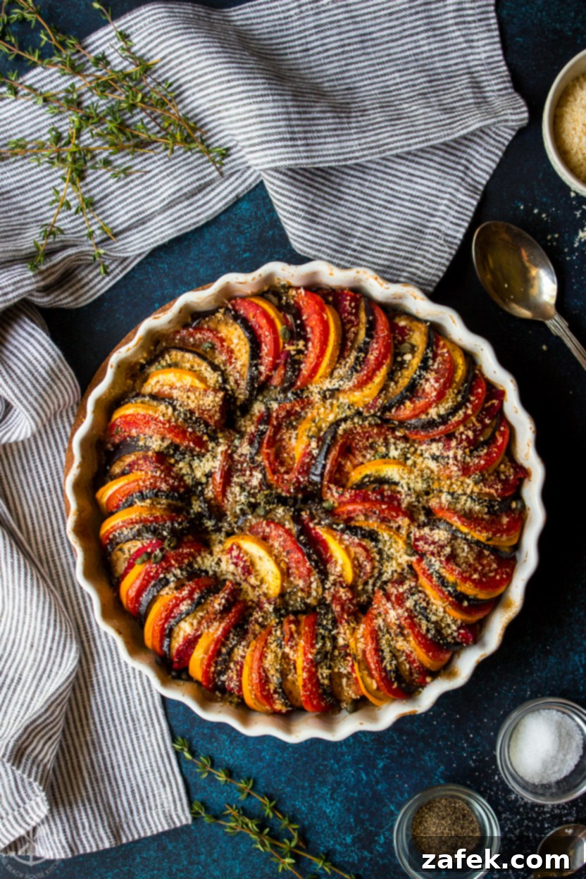 A beautifully layered Provençal Vegetable Tian, baked to golden perfection, ready to be served