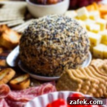 Epic Fall Cheese Board featuring the Everything Cheddar Horseradish Cheese Ball.