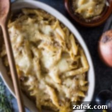 Gratin French Onion Pasta 2 Overhead shot of baking dish filled with French onion pasta, two smaller dishes filled with pasta and onion, prepared for a serving suggestion.