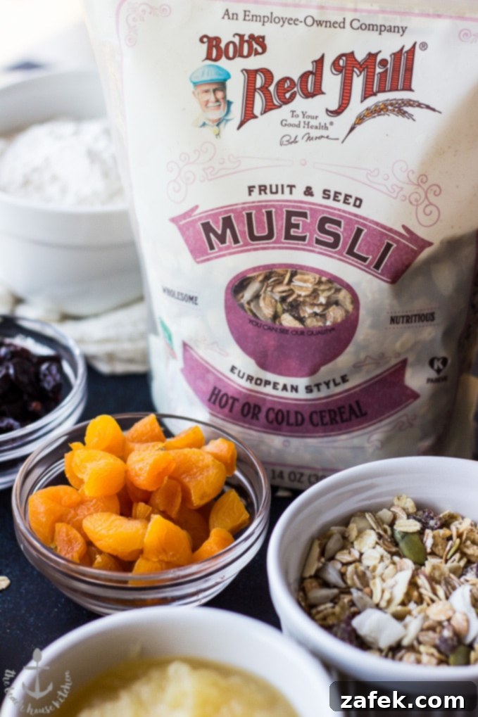 Loaded-Muesli-Quick-Bread Photo of Bob's Red Mill Fruit and Seed Muesli bag, dried apricots, and some muesli in bowls.