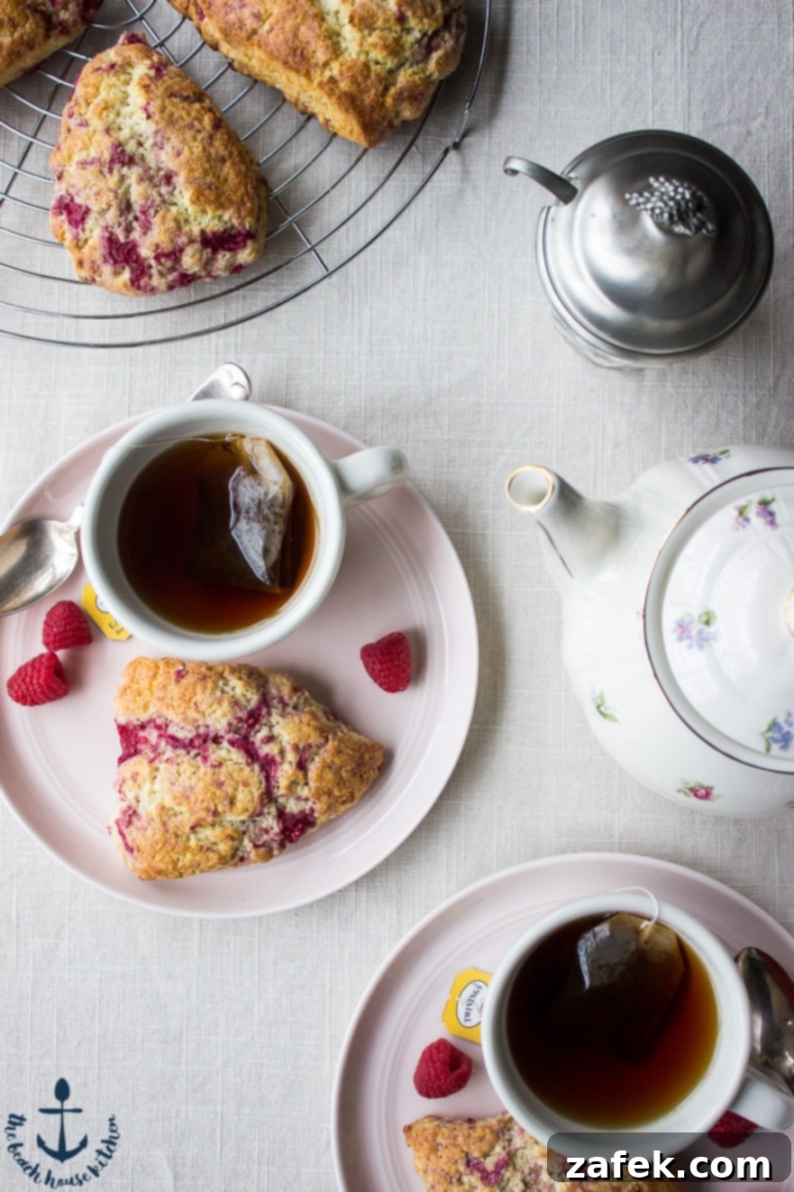 Freshly baked Raspberry Lemon Scones on a cooling rack