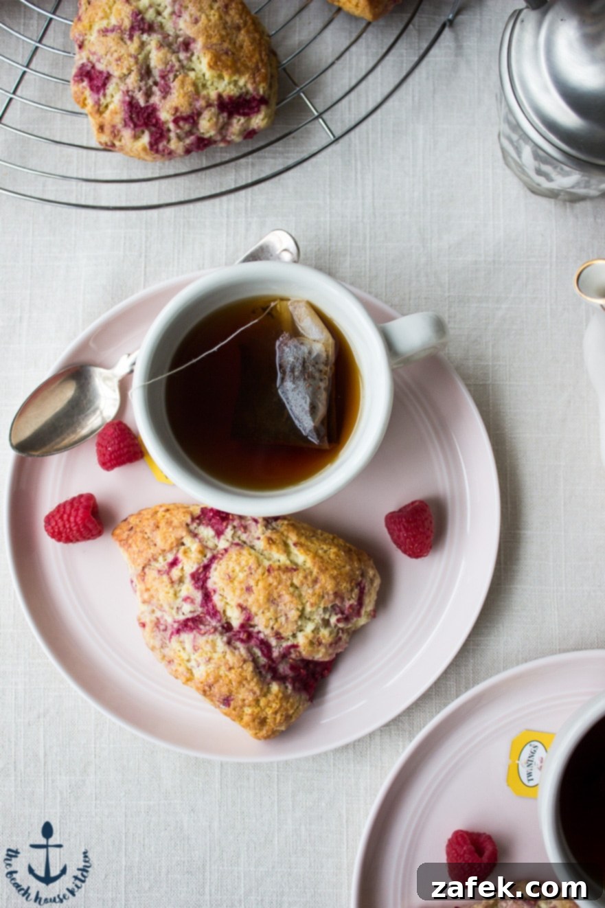 Stack of warm Raspberry Lemon Scones ready to be served