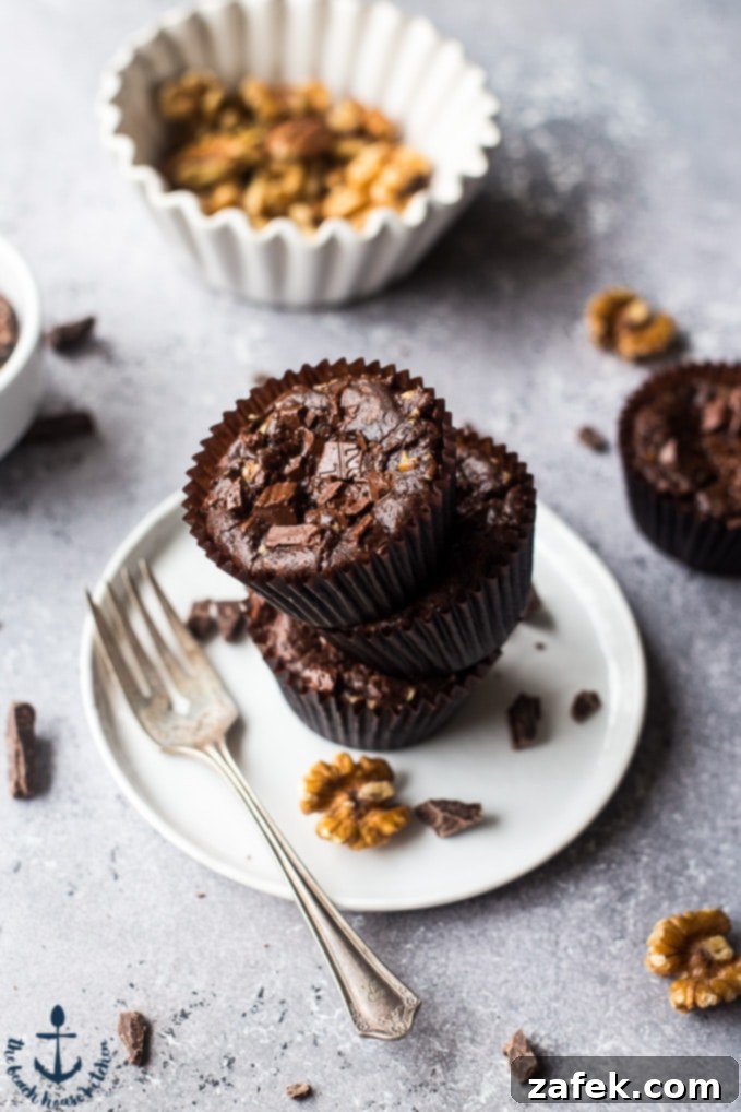 Double Chocolate Brownie Cupcakes Close-up of freshly baked Double Chocolate Brownie Cupcakes, showcasing their rich texture