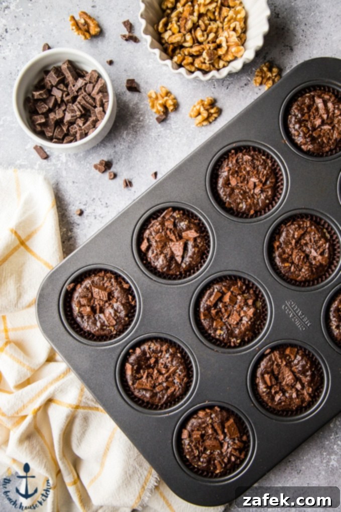 Double Chocolate Brownie Cupcakes Double Chocolate Brownie Cupcake with a scoop of vanilla ice cream, a perfect pairing
