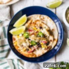 Cajun Seared Fish Tacos with Zesty Cilantro-Lime Slaw 2 Blackened Fish Tacos with Southwest Slaw