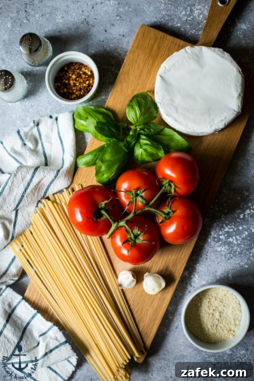 Fresh Ingredients for Linguine with Tomatoes, Basil and Brie Linguine with Tomatoes, Basil and Brie close-up