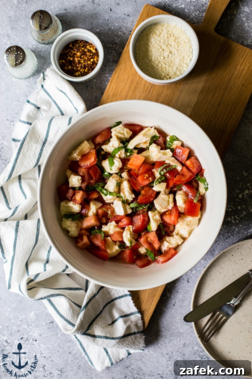 Delicious Linguine with Tomatoes, Basil and Brie Linguine with Tomatoes, Basil and Brie on a plate