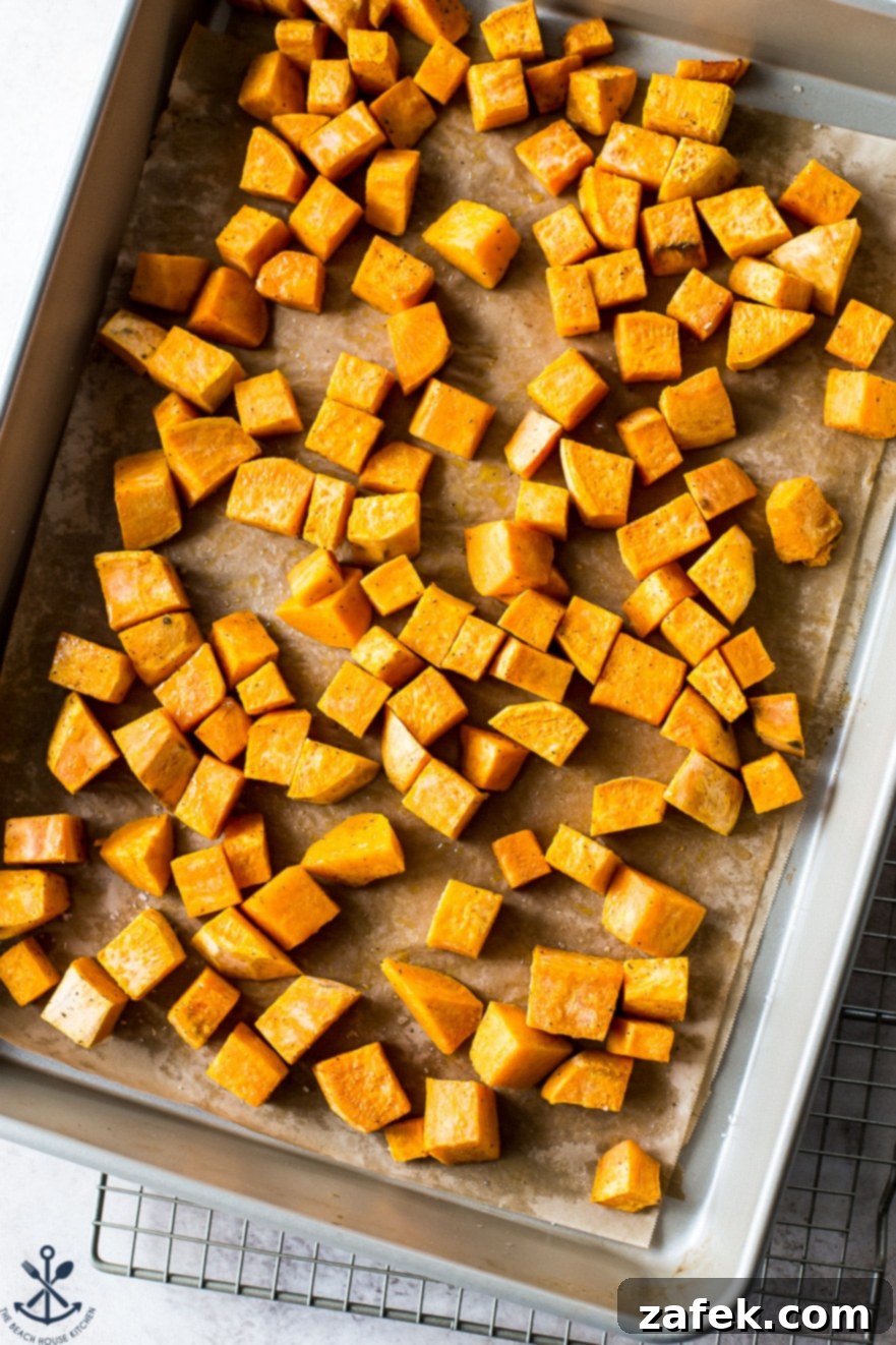 Fiery Sweet Potato Delight 3 Overhead photo of sweet potatoes on a baking sheet