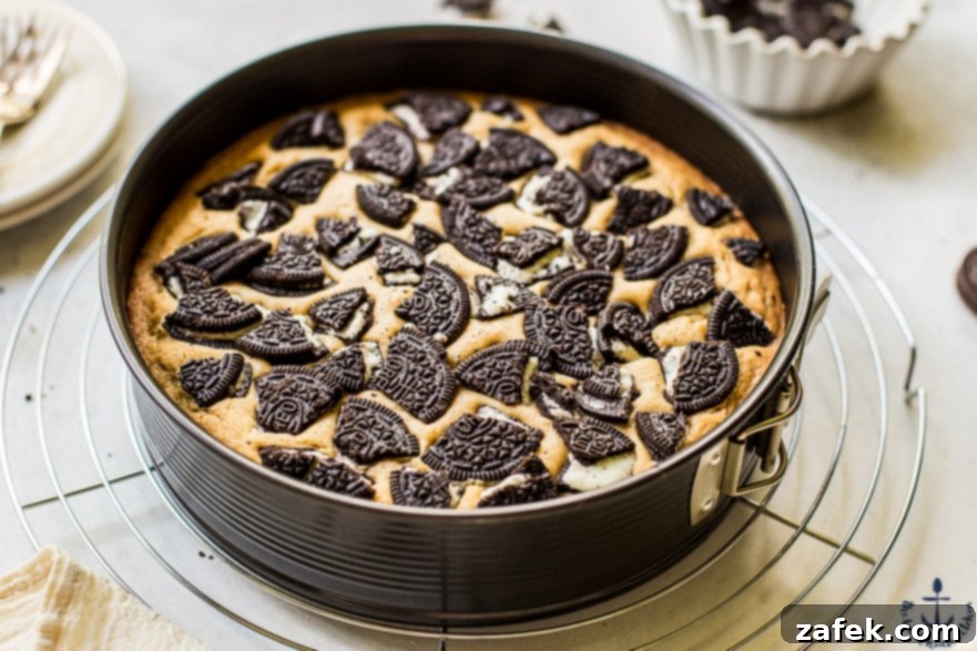 Scrumptious Oreo Blondies Ready for the Oven Oreo Blondies topped with crushed Oreo pieces, showcasing the enticing texture