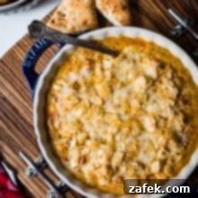Hot Cheesy Lobster Dip in a baking dish