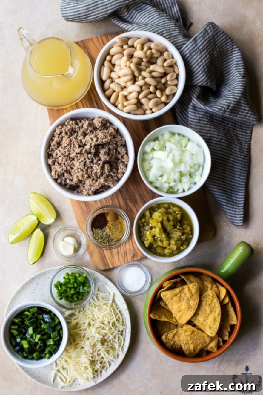 Overhead photo of the ingredients for White Bean Turkey Chili in bowls