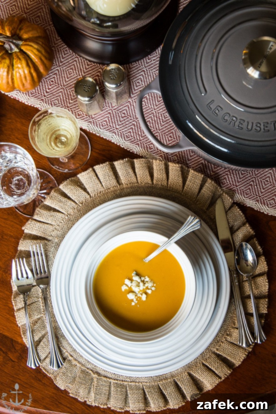 Close-up of creamy Roasted Butternut Squash Soup with garnish