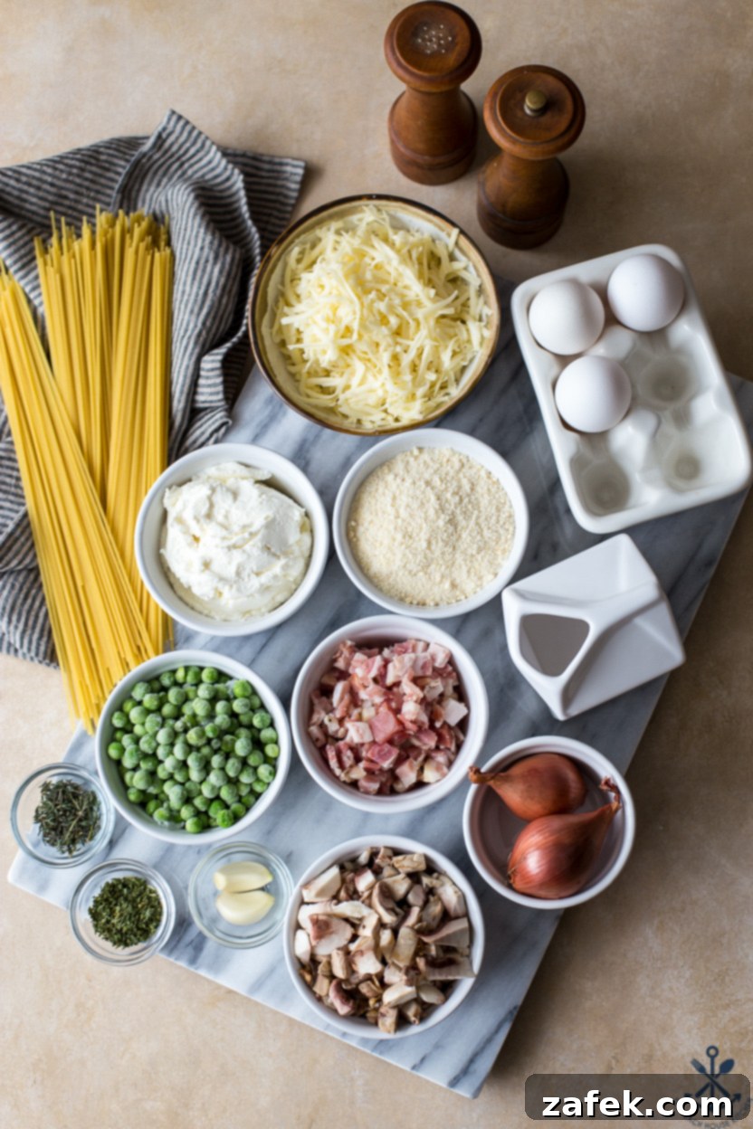 Hearty Pancetta, Mushroom & Pea Spaghetti Pie 5 Overhead photo of fresh ingredients for spaghetti pie, including thin spaghetti, shallots, garlic, mushrooms, peas, pancetta, and cheeses