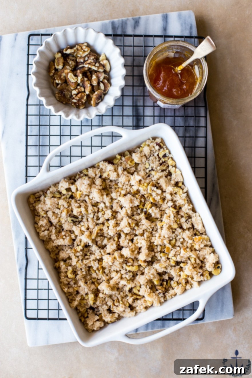 Apricot Walnut Streusel Bars Apricot Walnut Streusel Bars arranged artfully on a plate