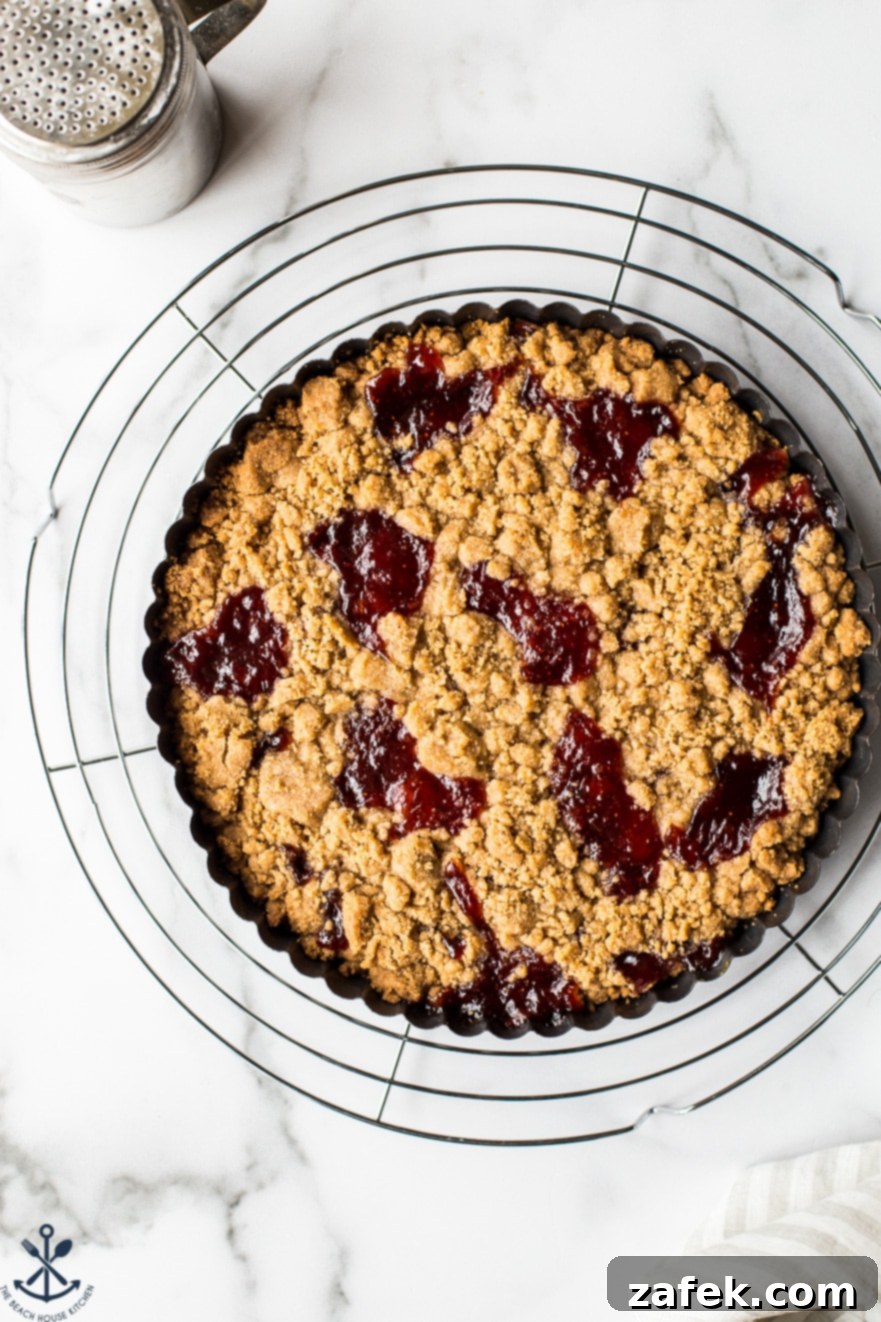 Overhead photo of Strawberry Jam Crumb Cookies on a round wire rack