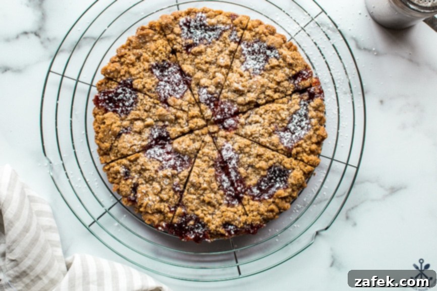 Overhead photo of crumb cookies on a round wire rack served and ready