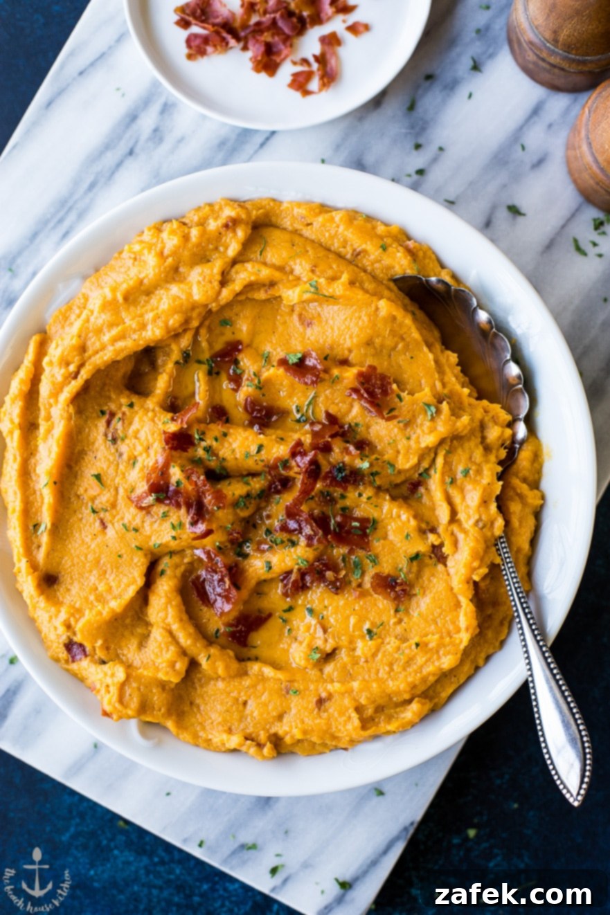 Heavenly Sweet Potato Mash with Prosciutto Crunch 4 Overhead shot of a full serving bowl of mashed sweet potatoes generously topped with golden-brown crispy prosciutto