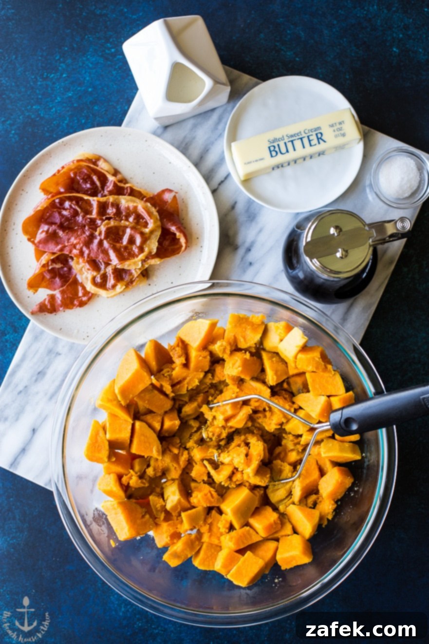 Heavenly Sweet Potato Mash with Prosciutto Crunch 5 Sweet potato cubes in a glass bowl, with a plate of crispy prosciutto pieces beside it, showcasing individual ingredients
