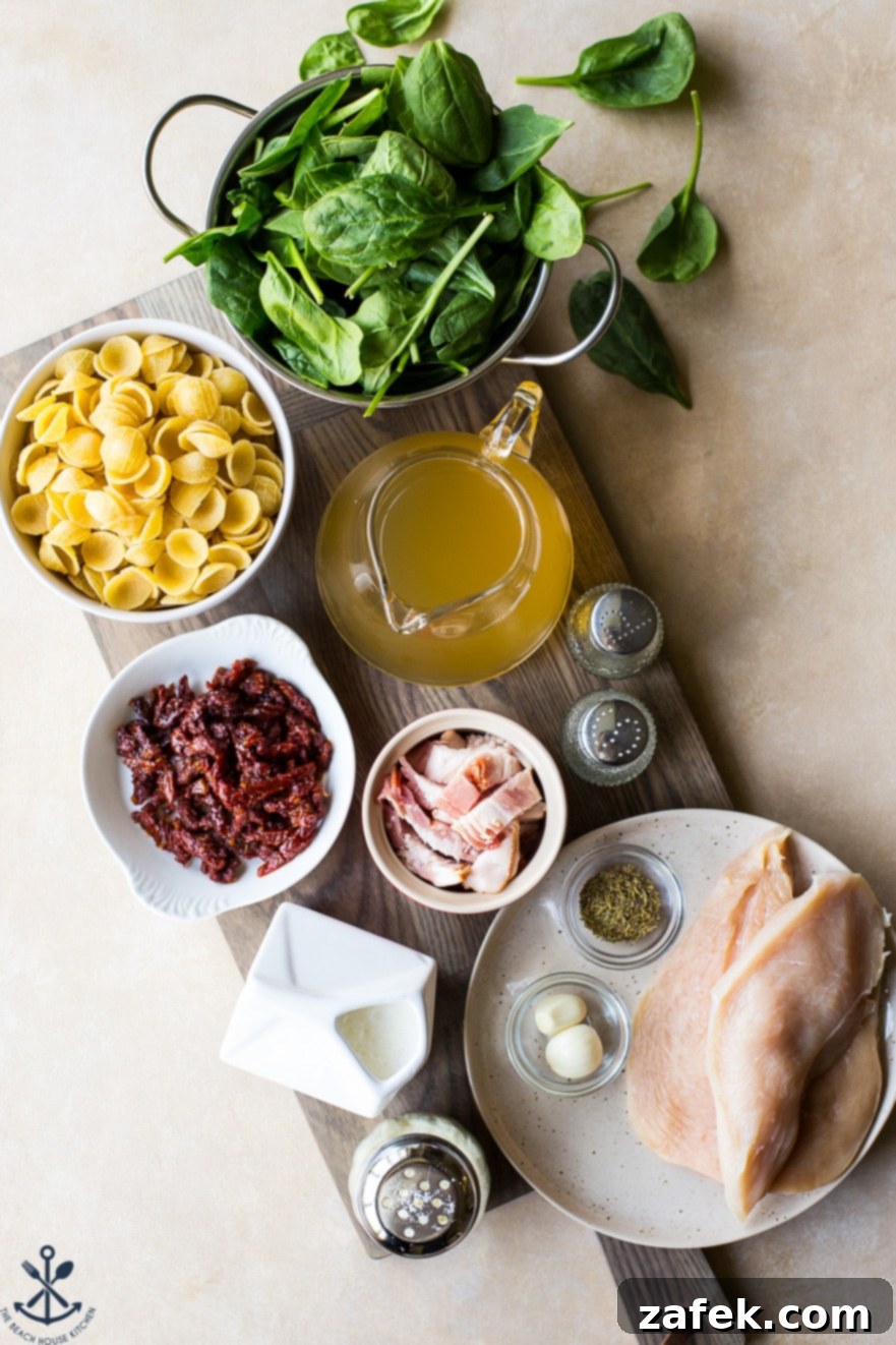 Tuscan Chicken Pasta with Sun-Dried Tomato Bacon Cream 3 Ingredients for Chicken Pasta with Sun-Dried Tomato Bacon Cream Sauce on a wooden board