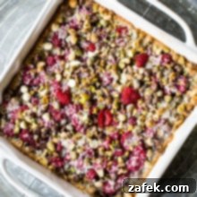 Overhead photo of Raspberry Pistachio Magic Bars, highlighting their inviting texture and vibrant colors.